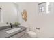 Small bathroom with gray vanity and decorative wall art at 2680 Westview Way # 55, Superior, CO 80027