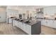 Modern kitchen with stainless steel appliances and large island at 2680 Westview Way # 55, Superior, CO 80027