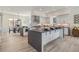 Modern kitchen with island and dining area at 2680 Westview Way # 55, Superior, CO 80027