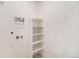 Bright laundry room with shelving and space for a washer and dryer at 2680 Westview Way # 55, Superior, CO 80027