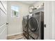 Convenient laundry room with washer and dryer at 1109 Larkspur Dr, Erie, CO 80516