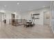 Upstairs dining area with a table for six and hardwood floors at 75 Clara Pl, Castle Pines, CO 80108