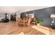 Bright dining room with hardwood floors and stylish table setting at 11699 Milwaukee St, Thornton, CO 80233