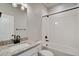 Clean bathroom with white subway tiles and granite countertop at 954 Plum Creek Ct, Brighton, CO 80601