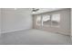 Bright bedroom with ceiling fan and carpet flooring at 954 Plum Creek Ct, Brighton, CO 80601