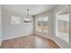 Bright dining room featuring hardwood floors and a chandelier at 954 Plum Creek Ct, Brighton, CO 80601