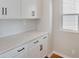 White cabinets and quartz countertops in a kitchen at 954 Plum Creek Ct, Brighton, CO 80601