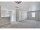 Large loft area with carpet and an additional window at 954 Plum Creek Ct, Brighton, CO 80601