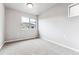 Bright bedroom with carpet flooring and a window offering a view at 125 Mesa Way, Superior, CO 80027