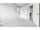 Bedroom with carpet flooring, sliding closet doors and an additional door at 125 Mesa Way, Superior, CO 80027