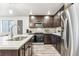 Modern kitchen with stainless steel appliances and an island at 125 Mesa Way, Superior, CO 80027