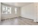 Bright bedroom with neutral walls and light grey carpeting at 14063 Deertrack Ln, Parker, CO 80134