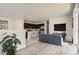 Modern kitchen with dark cabinetry, island, and stainless steel appliances at 14063 Deertrack Ln, Parker, CO 80134