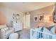 bedroom with crib, accent wall, and plenty of natural light at 4326 Canyata Dr, Elizabeth, CO 80107