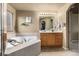 Bathroom features a large vanity and soaking tub at 5286 Tall Spruce St, Brighton, CO 80601