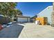 View of the garage and backyard at 7321 Carnation Pl, Commerce City, CO 80022