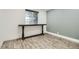 Finished basement room with dark wood bar at 7321 Carnation Pl, Commerce City, CO 80022