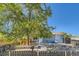 Charming ranch home with mature tree and landscaped yard at 7321 Carnation Pl, Commerce City, CO 80022