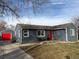 Charming single-story home with a bright red door and attached garage at 1275 S Wolff St, Denver, CO 80219