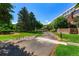 Well-maintained pathway meandering through the community's landscape at 7000 E Quincy Ave # 204, Denver, CO 80237