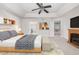 Main bedroom with access to bathroom and upper level at 12030 Song Bird Hills St, Parker, CO 80138