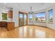 Spacious dining area with hardwood floors and abundant natural light at 1199 Links Ct, Erie, CO 80516