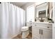 Clean bathroom with white vanity and a shower/tub combo at 1786 Quartz St, Castle Rock, CO 80109