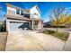 Charming two-story home with a welcoming front porch and attached two-car garage at 1786 Quartz St, Castle Rock, CO 80109