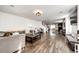 Spacious living room with hardwood floors and large windows at 1786 Quartz St, Castle Rock, CO 80109