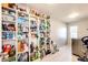 Well-stocked pantry with ample shelving for storage at 1786 Quartz St, Castle Rock, CO 80109