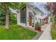 Modern home with gray and white exterior and patio at 1468 S Washington St, Denver, CO 80210