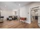 Spacious living area with hardwood floors and access to kitchen at 1468 S Washington St, Denver, CO 80210