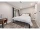 Cozy and bright basement bedroom with window and neutral decor at 1468 S Washington St, Denver, CO 80210