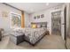 Spacious bedroom with ensuite access and plenty of natural light at 1468 S Washington St, Denver, CO 80210