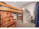 Small bedroom with a built-in bunk bed and ample storage at 1468 S Washington St, Denver, CO 80210