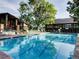 Outdoor community pool with lounge chairs at 3164 S Wheeling Way # 308, Aurora, CO 80014
