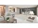Living room, dining area, and kitchen with staged furniture and sliding doors at 3164 S Wheeling Way # 308, Aurora, CO 80014