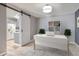 Home office with desk and built-in shelving, open to kitchen at 3164 S Wheeling Way # 308, Aurora, CO 80014