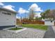 Side yard with fire hydrant and gravel landscaping at 4155 S Delaware St, Englewood, CO 80110