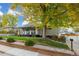 House exterior with front porch and landscaping at 4155 S Delaware St, Englewood, CO 80110