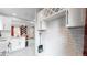 White kitchen cabinets and subway tile backsplash at 730 E Alameda Ave, Denver, CO 80209