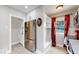 Modern kitchen with stainless steel appliances and built-in bench at 730 E Alameda Ave, Denver, CO 80209
