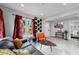 Open concept living room with a view of the front door and bedroom at 730 E Alameda Ave, Denver, CO 80209