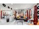 Open living room and kitchen area with mid-century modern decor at 730 E Alameda Ave, Denver, CO 80209