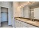 Modern bathroom with double vanity and shower at 460 Millwall Cir, Castle Pines, CO 80108