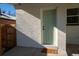 Backyard detail showing light green door and patio at 2736 Meade St, Denver, CO 80211