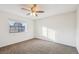 Bright bedroom with large window and ceiling fan at 1193 S Sable Blvd # H, Aurora, CO 80012