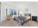 Cozy bedroom with a bed, window seat and ample natural light at 8224 Washington St # 12, Denver, CO 80229