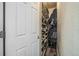 Open coat closet with shelving for shoes and outerwear at 13644 Ulster St, Thornton, CO 80602