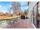 Cozy patio with seating area and built-in grill at 904 S Oakland Ct, Aurora, CO 80012